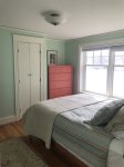 First floor guest room with a queen bed.